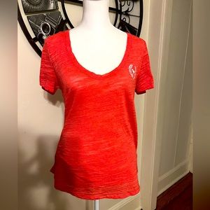 VS Pink v-neck tee. Peachy pink color. Size xs. Great condition.